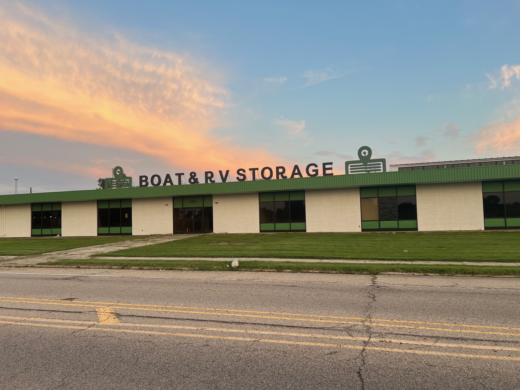 Exterior photo of Bon Voyage Storage Sign with Letters that read Boat and RV Storage on top